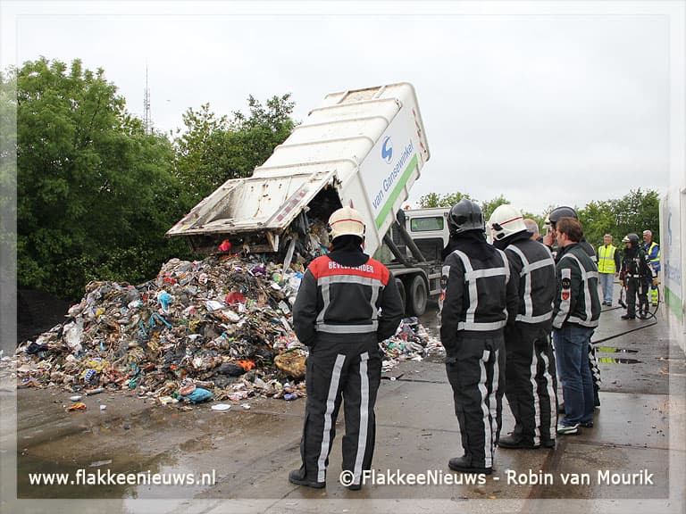 Steekvlam uit vuilniswagen