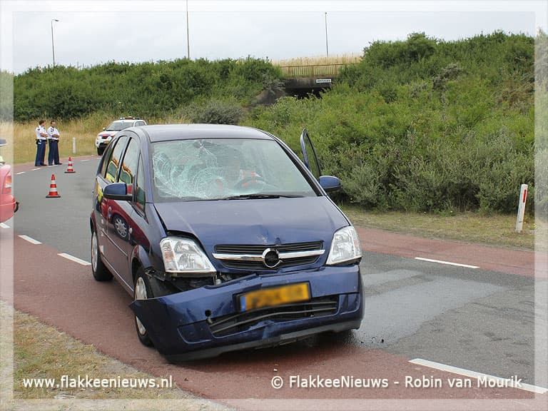Motorrijder frontaal tegen personenwagen
