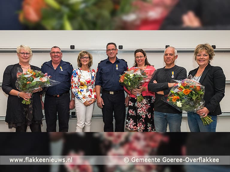 De drie brandweermannen koninklijk onderscheiden