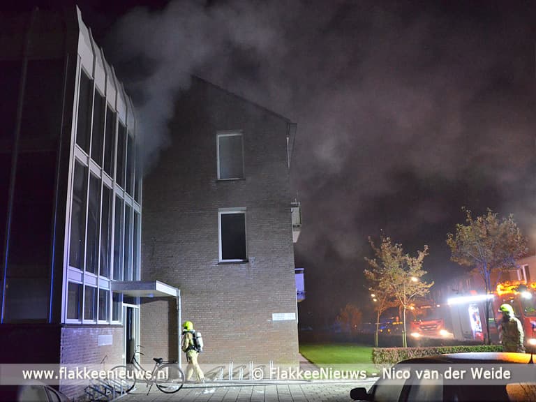 Bewoners opgeschrikt door brand in portiek