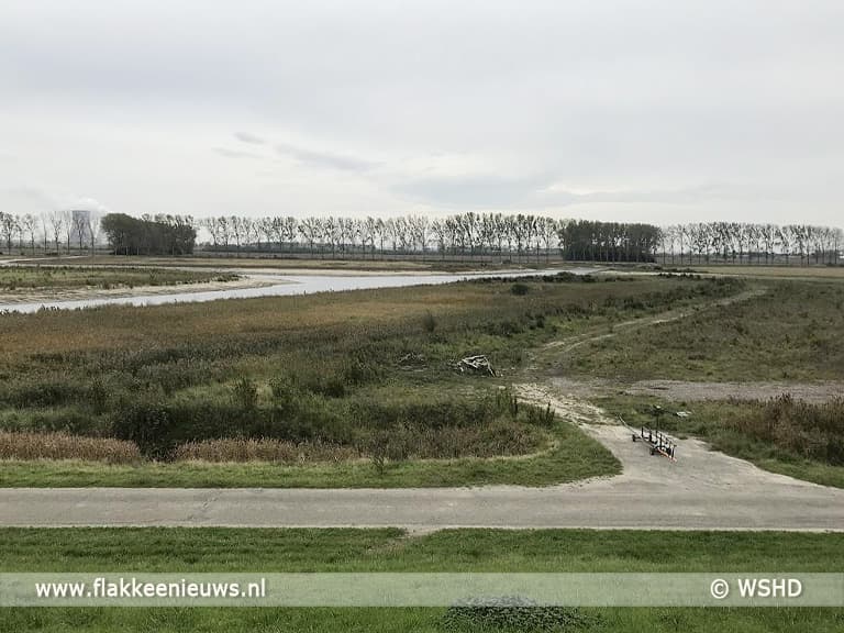 Proef om sterkte van dijken met een zandondergrond te testen