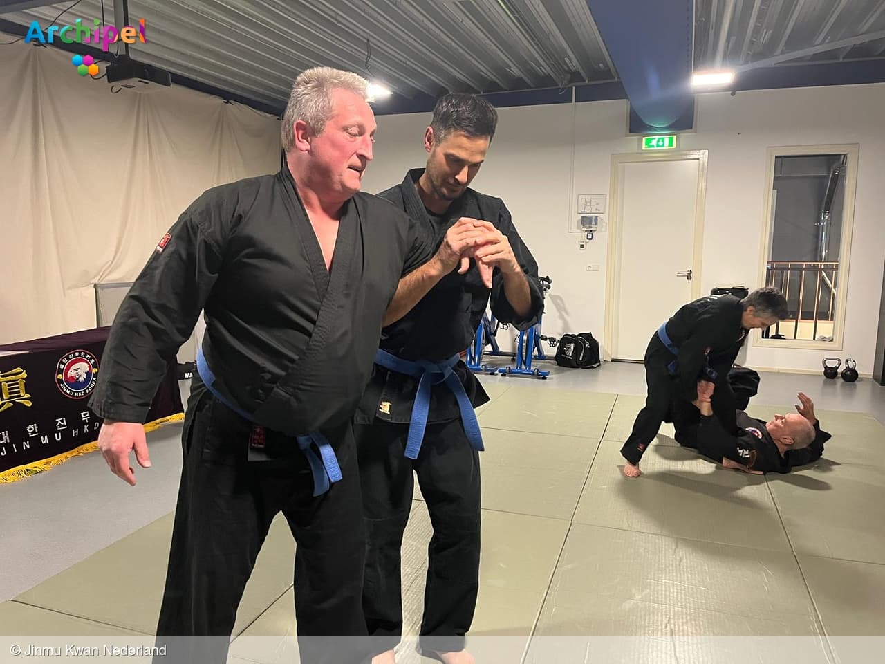 Hoog niveau tijdens hapkido-examens bij Jinmu Kwan Nederland