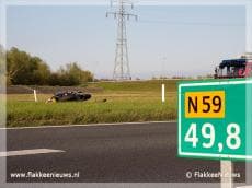 Motorrijder ten val op N59