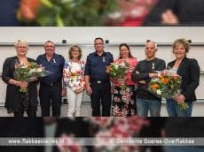 De drie brandweermannen koninklijk onderscheiden