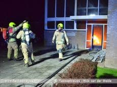 Bewoners opgeschrikt door brand in portiek