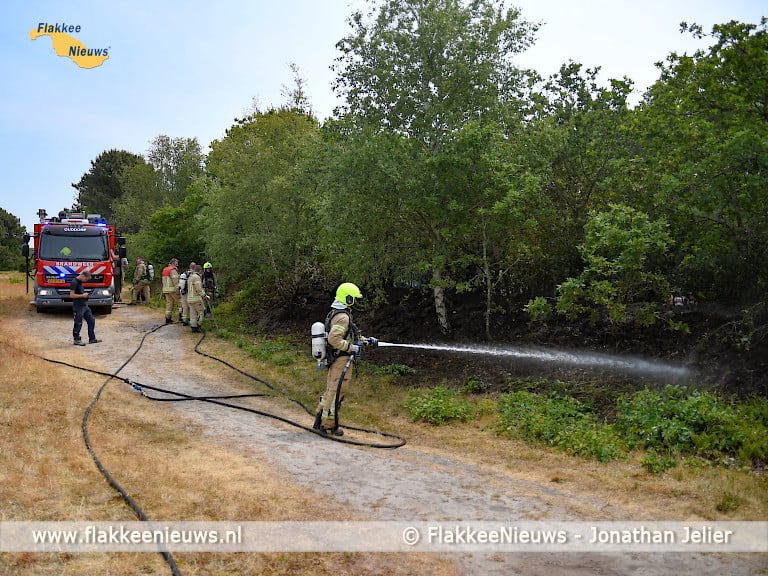 Brandweer blust brand in natuurgebied Kleistee