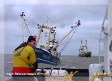 Viskotter op het strand
