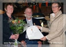 Oud Redder ontvangt lintje