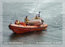 Zeilbootje omgeslagen