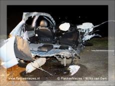 Auto door midden Oudelandsedijk Middelharnis