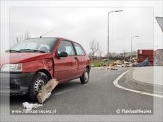 Vrachtwagen met puin geschaard bij Oude-Tonge
