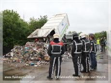 Steekvlam uit vuilniswagen