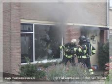 Brandweer haalt kat uit brandende woning