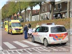 Fietser slaat over de kop