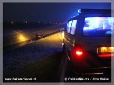 Auto ondersteboven in de sloot