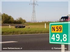 Motorrijder ten val op N59