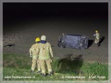 Auto over de kop bij Dirksland