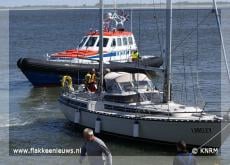 Jacht op de pier bij Stellendam